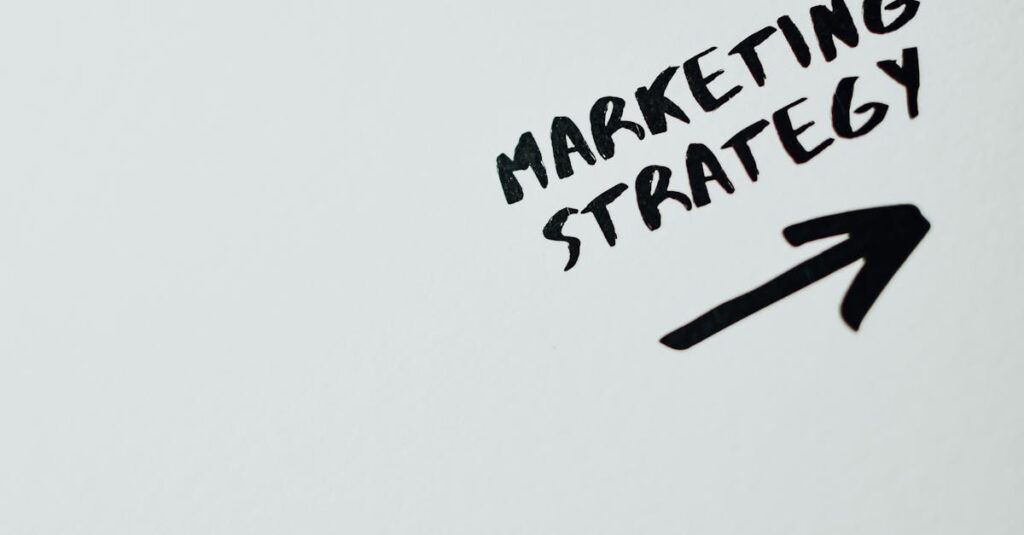 Close-up of handwritten 'Marketing Strategy' text with an arrow on white background.